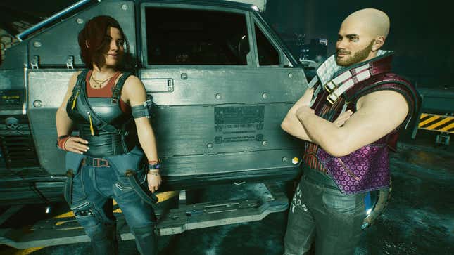 Claire and V are shown standing next to her giant combat truck.