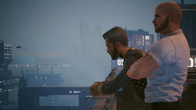 Kerry and V are shown looking down at Night City from a balcony.